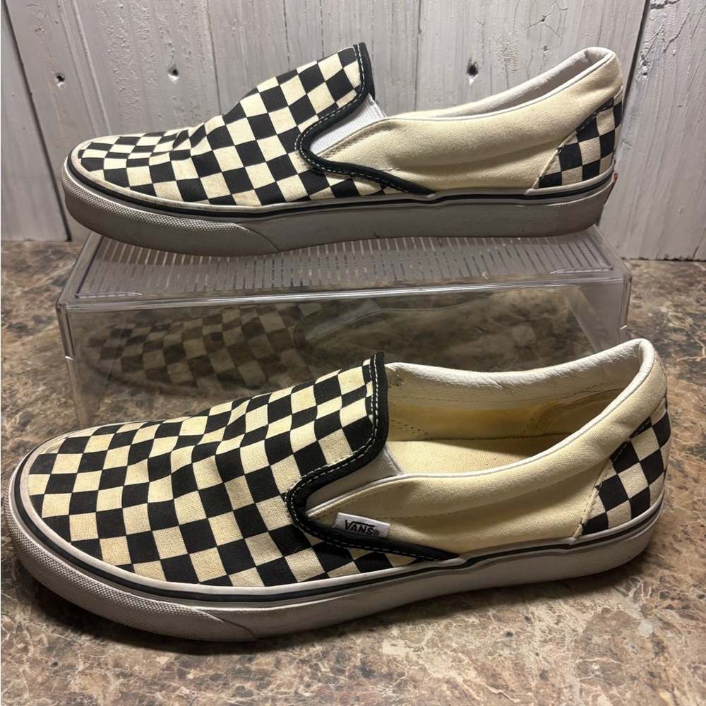 Vans Men's Black and Cream Checkered Slip-On Sneakers